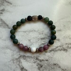 Green and purple boho beaded bracelet